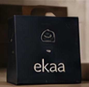 A deep blue Ekaa box with a cream wordmark.